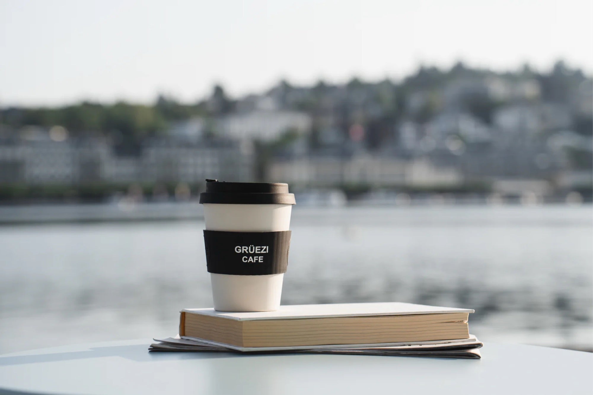 GRÜEZI × eCoffee reusable cup at Lake Lucerne